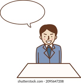 A smiling man in a suit talking.