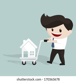 Smiling man using trolley to transport home icon