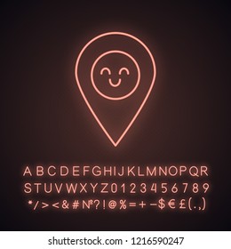 Smiling map pin character neon light icon. Easy GPS navigation. Happy map pinpoint, marker. Emoji, emoticon. Glowing sign with alphabet, numbers and symbols. Vector isolated illustration
