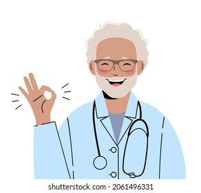 Smiling mature doctor with glasses gestures that everything is in order. Ok-gesture.	