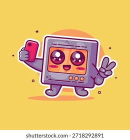 smiling microwave character mascot taking a selfie with a smartphone isolated cartoon 
