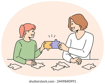 Smiling mother and daughter solve puzzles together. Happy mom and girl child connect jigsaw pieces engaged in funny game sitting at table. Vector illustration.