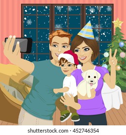 Smiling mother, father and little son making selfie with camera over living room and christmas tree background. Family, holidays, technology and people
