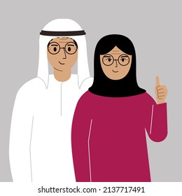 Smiling muslim couple, good mood concept. Positive emotions, happy people, man and woman showing thumbs up, fun and joy.