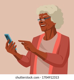 Smiling old woman shopping online. Mature senior woman using smartphone. 