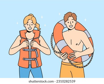 Smiling people in lifejacket and lifebuoy working on seashore. Happy lifeguards in inflatable vest and ring. Life saving and occupation. Vector illustration. 