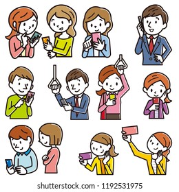 Smiling people using smart phones