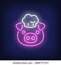 Smiling pig in chef hat. Neon sign element. Night bright advertisement. Vector illustration for restaurant, cafe, diner, menu, advertising design