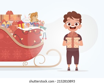 Smiling preschool boy standing and holding a box with a bow. Christmas. Cartoon style. Vector illustration