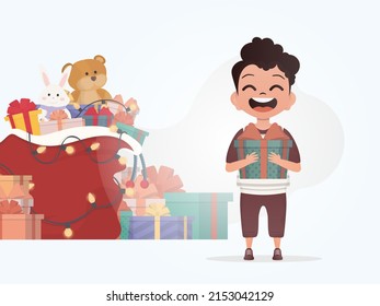 Smiling preschool boy standing and holding a box with a bow. New Year. Cartoon style. Vector illustration