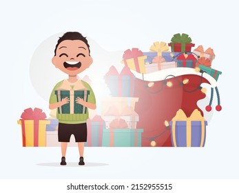 Smiling preschool boy stands and holds a beautiful box. Christmas. Cartoon style. Vector illustration