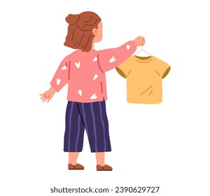 Smiling preschool girl holding and hanging t-shirt on hanger. Cute child cartoon kid character takes care of her clothes. Childhood and preschool development. Clothing and dress, garment care