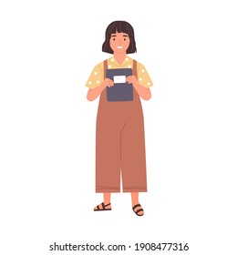 Smiling schoolgirl holding school notebook in her hands. Happy girl with bob hairstyle. Kid in overalls carrying exercise book. Colored flat vector illustration isolated on white background