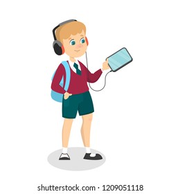 Smiling schoolkid holding gadget in arms. Modern technology addiction concept. Boy with smartphone and headphones listen to music. Isolated vector illustration in cartoon style