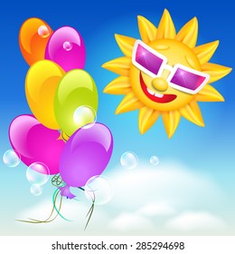 Smiling shines sun in glasses on blue sky background and balloons