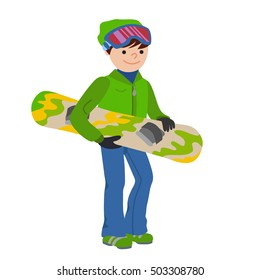 Smiling snowboarder man in winter ski sportswear, helmet and goggles standing with snowboard in hand. Winter outdoor activity, extreme sports and healthy lifestyle.