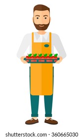 Smiling supermarket worker.