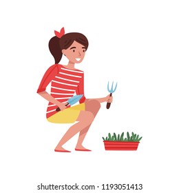 Smiling teenager girl with small shovel and rake in hands, caring for garden plant. Nature theme. Flat vector design
