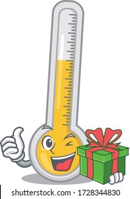 Caricatura sonriente caliente termómetro con caja de regalo verde