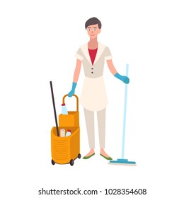 Smiling woman dressed in uniform holding floor mop and bucket cart. Female home cleaner, cleaning or housekeeping service worker isolated on white background. Flat cartoon vector illustration.