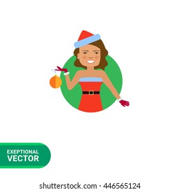 Smiling woman holding Christmas ball