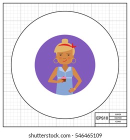 Smiling woman holding cupcake