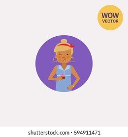 Smiling woman holding cupcake