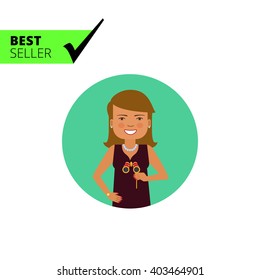 Smiling woman holding opera glasses