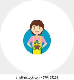 Smiling woman holding pot with flowers