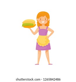 Smiling woman holding stack of clean folded clothes. Cartoon character of housewife. Laundry theme. Flat vector design