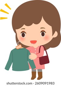 Smiling woman looking at clothes on hangers