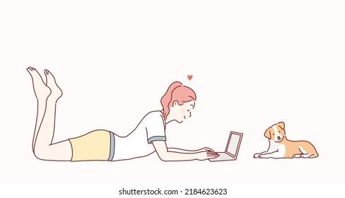 smiling woman lying on a carpet with notebook in living room. Hand drawn style vector design illustrations.