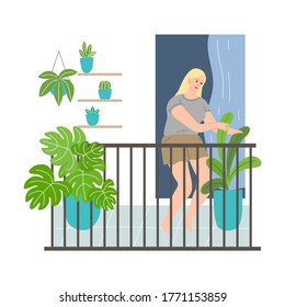 Smiling woman standing on balcony and taking care of plants in pots