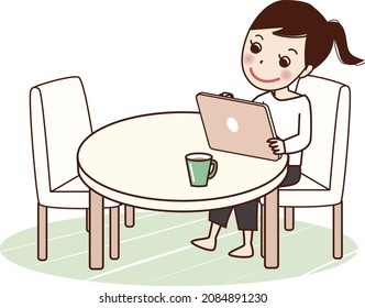 A smiling woman using a tablet at the table.