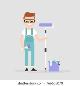 Smiling worker holding a paint roller. Renovating the house. Young character wearing a jumpsuit. Flat editable vector illustration, clip art
