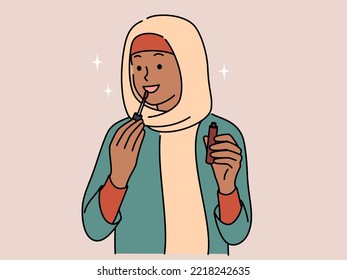 Smiling young Arabic woman in hijab applying lip gloss on lips. Happy Arabian girl do makeup. Beauty and cosmetics. Vector illustration. 