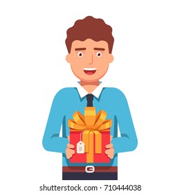 Smiling young business man wearing shirt and tie holding in hands gift box with large ribbon as a present for a corporate client. Flat style vector illustration isolated on white background.
