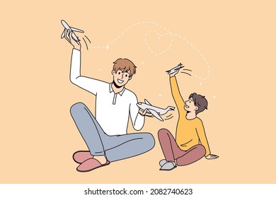 Smiling young father play with small son with airplanes. Loving happy dad have fun enjoy family weekend with boy child with toys engaged in game together. Vector illustration, cartoon character. 