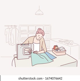 Smiling young girl sewing on a sewing machine. Hand drawn style vector design illustrations.