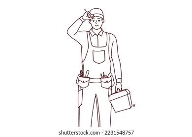 Joven y sonriente trabajador de mantenimiento uniformado con herramientas en las manos. Feliz hombre reparador o mecánico con caja de instrumentos y equipo. Ilustración vectorial. 