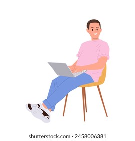 Smiling young man freelancer cartoon character sitting on chair and working online using laptop