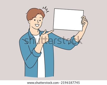 Smiling young man hold white mockup placard point at good deal or offer. Happy guy demonstrate empty banner recommend service. Vector illustration. 