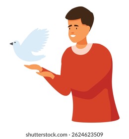 Smiling young man is holding a white dove, a symbol of peace and freedom