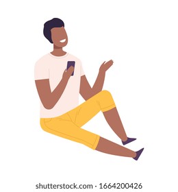 Smiling Young Man with Modern Digital Gadget, Guy Sitting on the Floor and Communicating Using His Smartphone Flat Vector Illustration