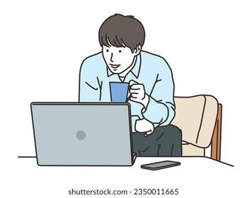 Smiling young man operating a PC in plain clothes
