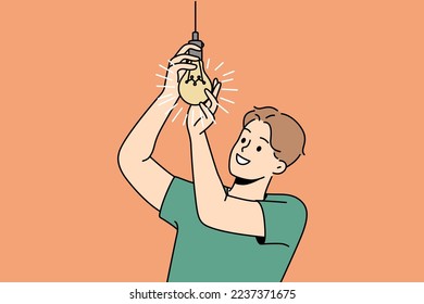 Smiling young man screwing lightbulb at home. Happy guy connect light bulb for light indoors. Vector illustration. 