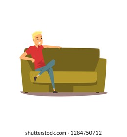 Smiling young man sitting on the couch vector Illustration