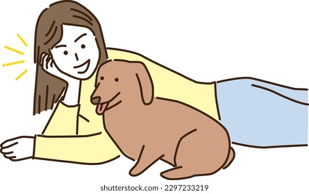 Smiling young woman lying with her dog