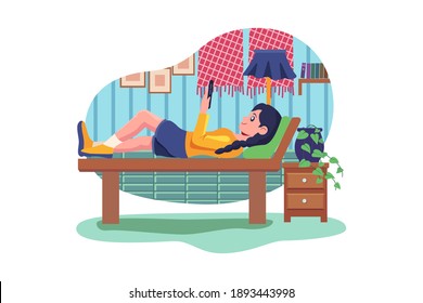 Smiling Young Woman Lying On Bed Listening To Music On Wireless Speaker