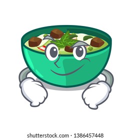 Smirking green churry above mascot table wood